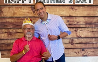 Father and Son Posing with Fake Mustache Prop for Father's Day